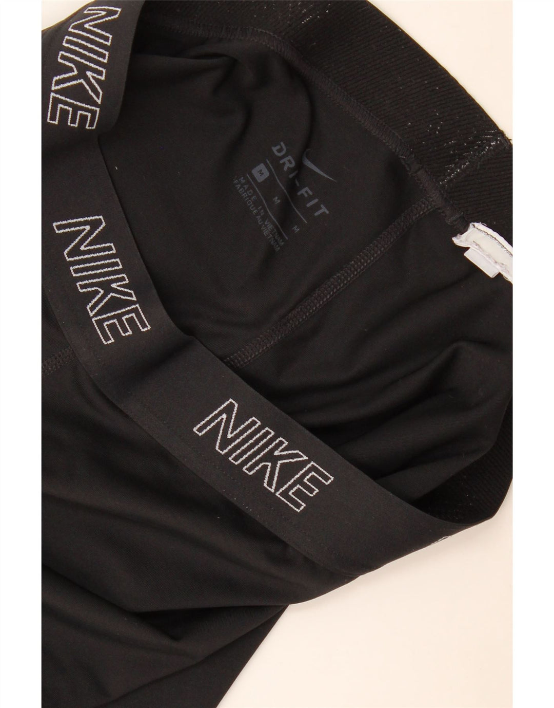 Damskie legginsy Nike Dri Fit Graphic Capri UK 12, średnie czarne