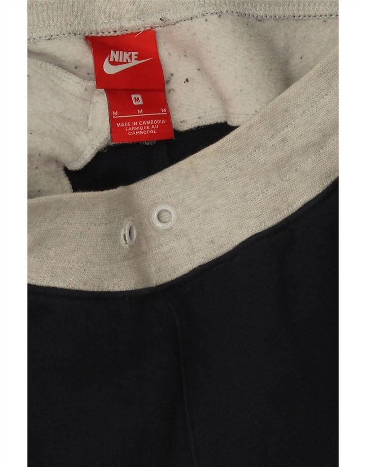 Męskie spodnie dresowe Nike Air, joggery, średni granat, blok kolorów