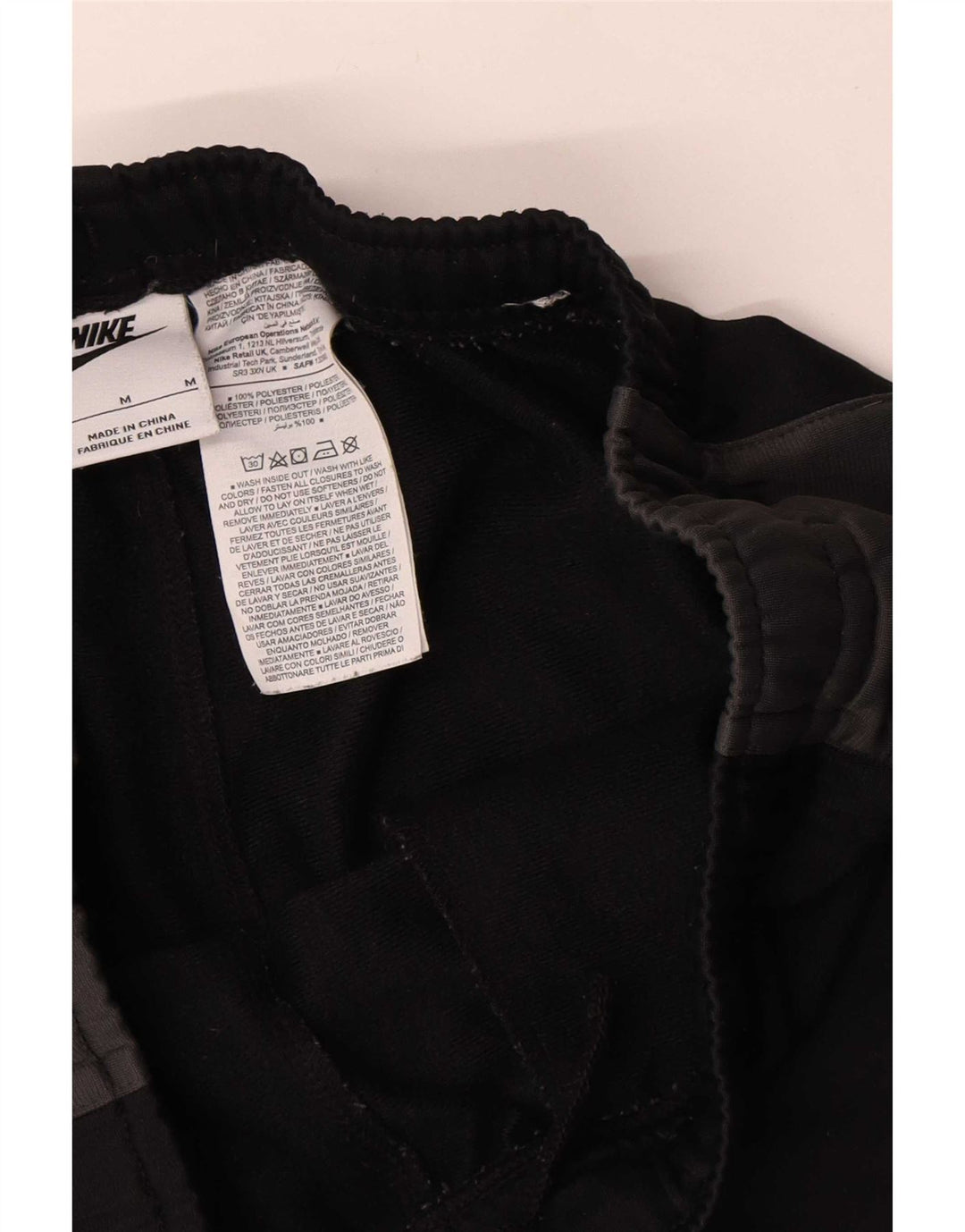 Męskie spodnie dresowe Nike Joggers, poliester w kolorze średniej czerni