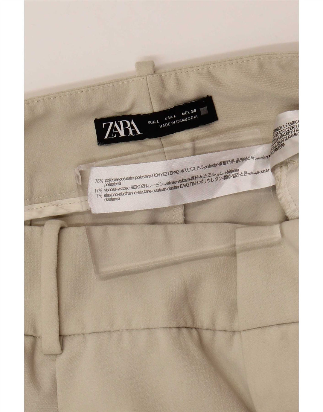 Damskie zwężane spodnie garniturowe Zara, duże W30 L26, beżowy poliester