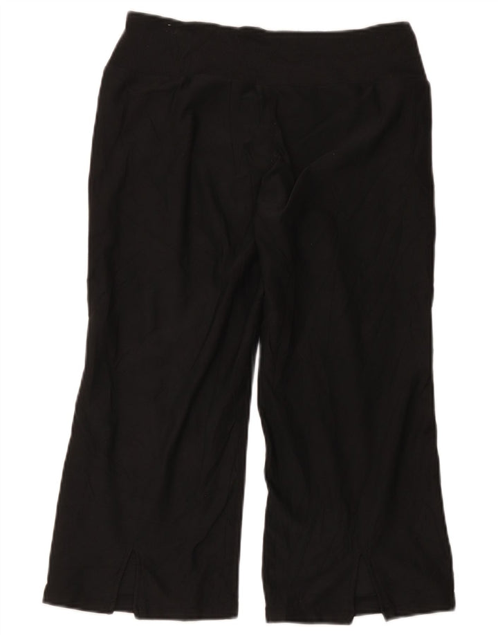 Damskie spodnie dresowe Nike Capri US 8/10, średni czarny poliester