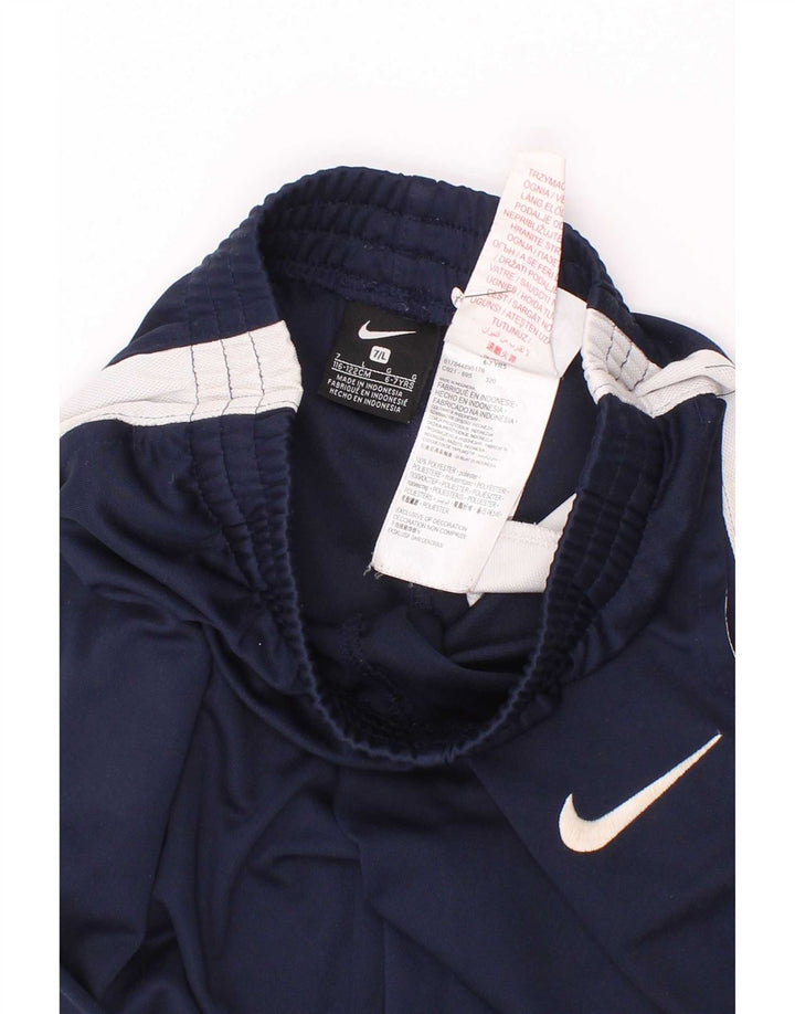 Chłopięce spodnie dresowe Nike w wieku 6-7 lat, duże, granatowe, z blokami kolorów