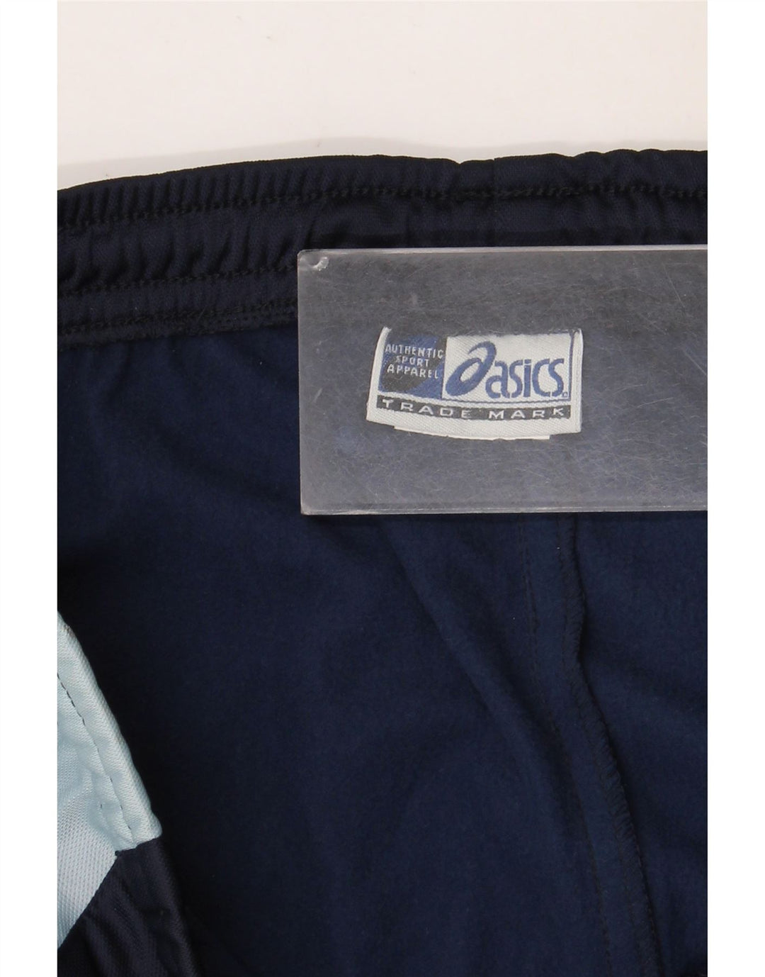 Męskie spodnie dresowe Asics XL, granatowe, z blokami kolorów, poliestrowe