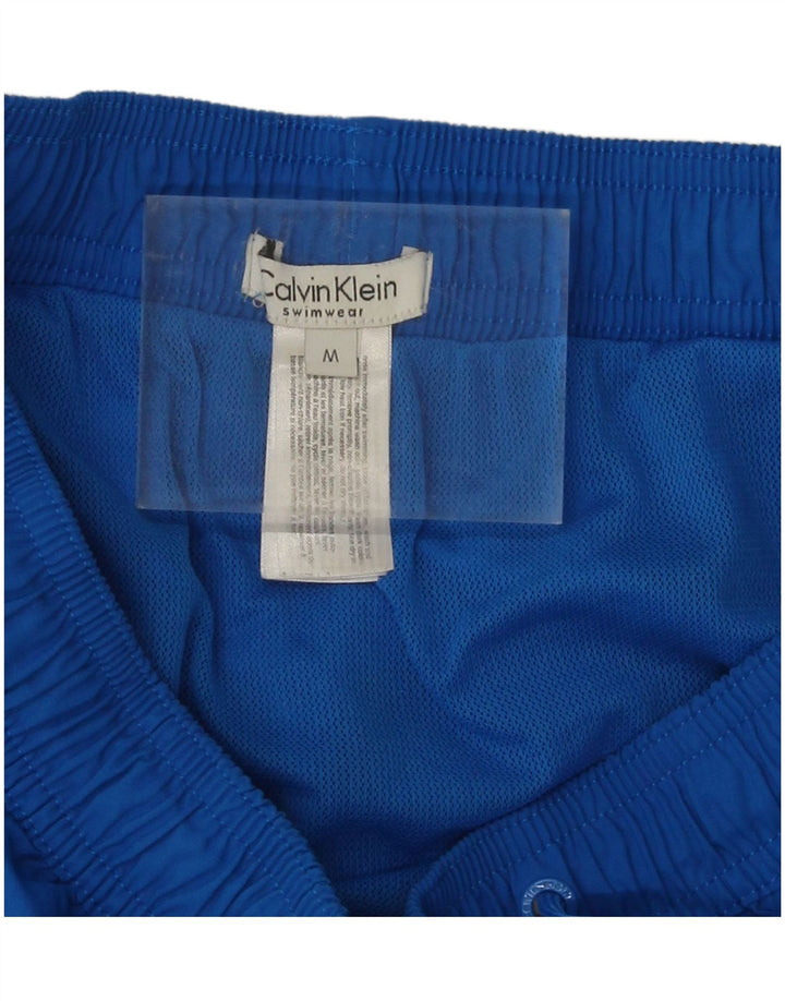 Męskie spodenki kąpielowe Calvin Klein, kolor średni niebieski