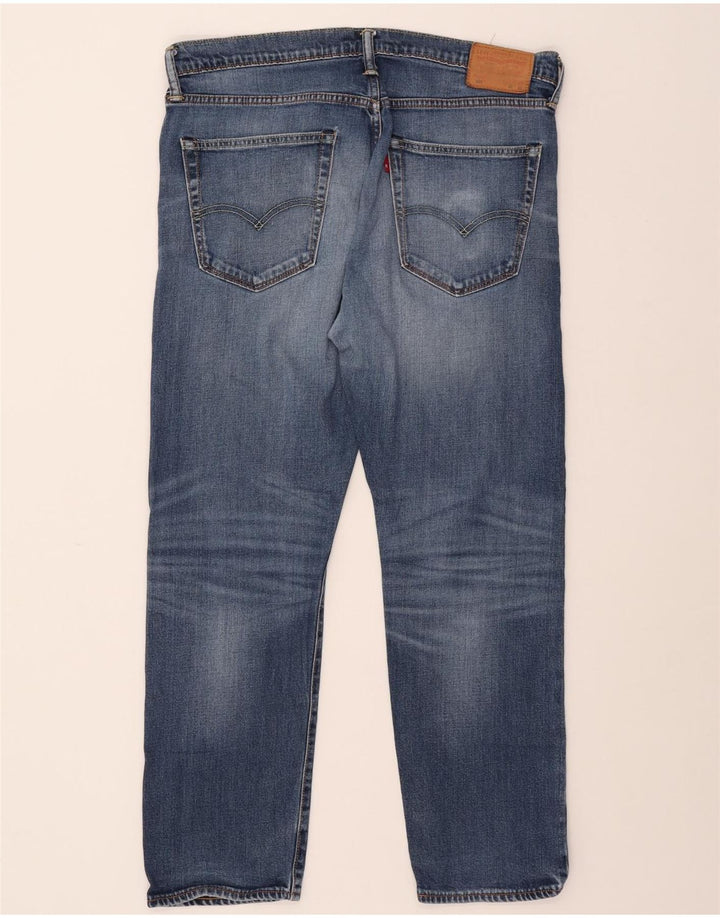 Męskie jeansy LEVI'S 502 zwężane W36 L28 niebieska bawełna
