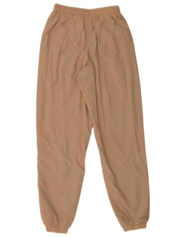 Damskie spodnie dresowe Adidas Graphic Joggers UK 4 XS Beżowy blok kolorów