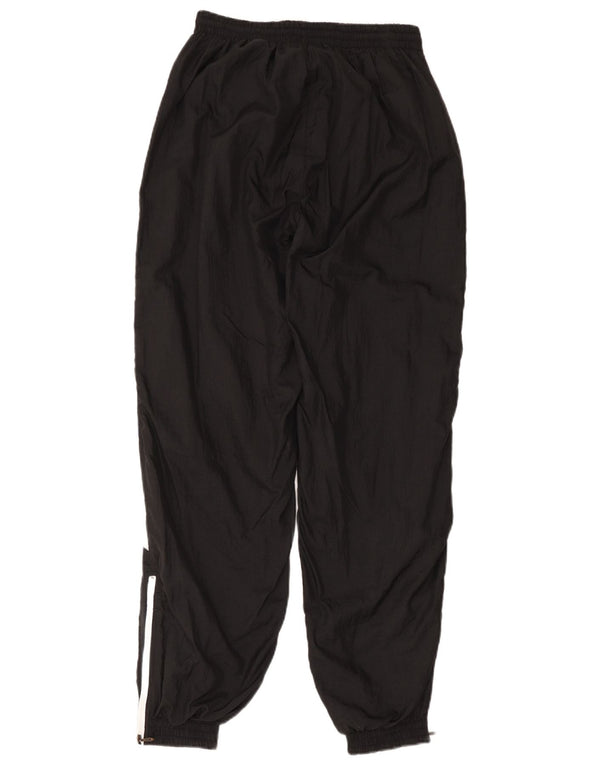 Damskie spodnie dresowe Puma Joggers UK 12 Średni czarny, blok kolorów