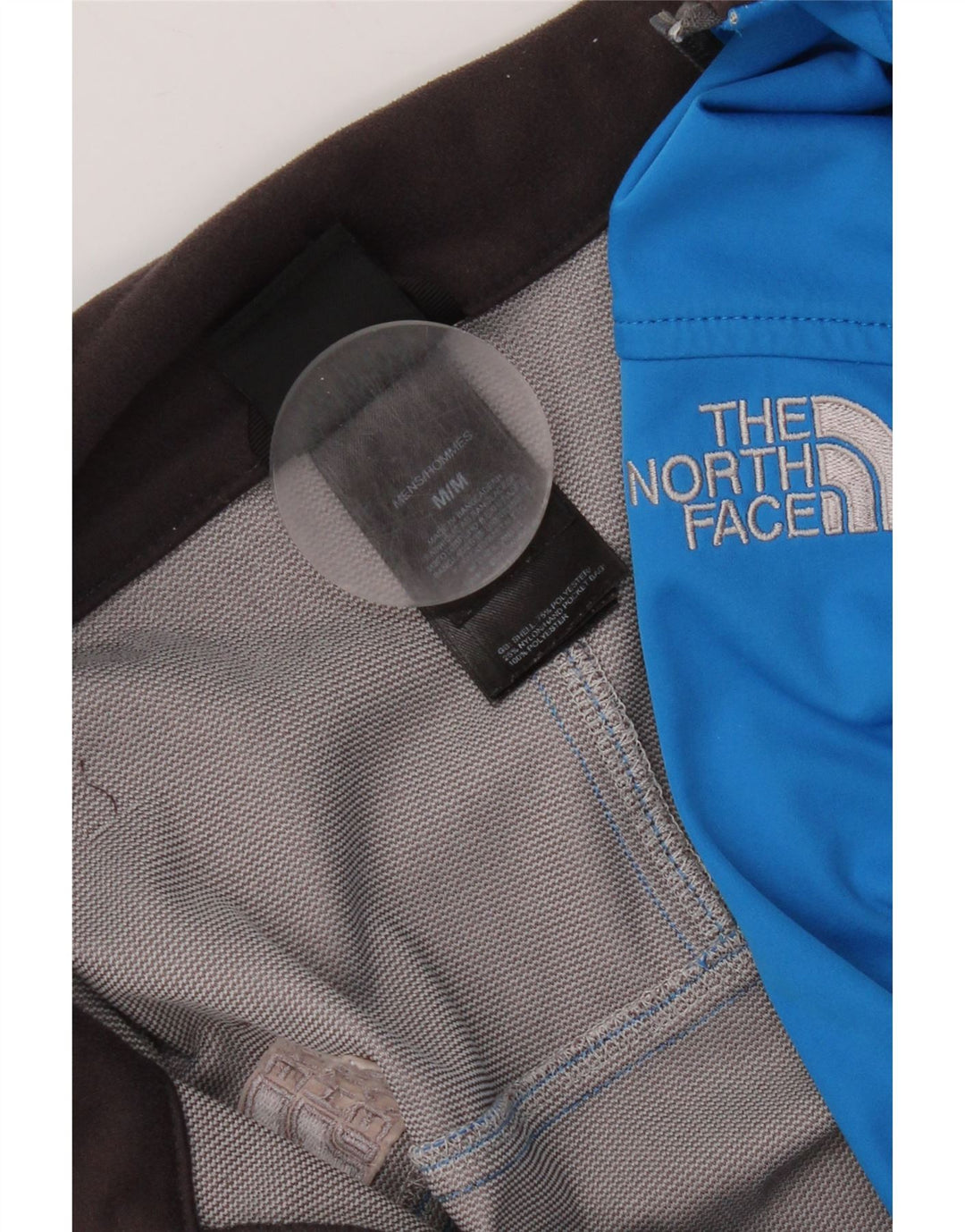 Męska kurtka dresowa The North Face z poliestru w kolorze średnioniebieskim