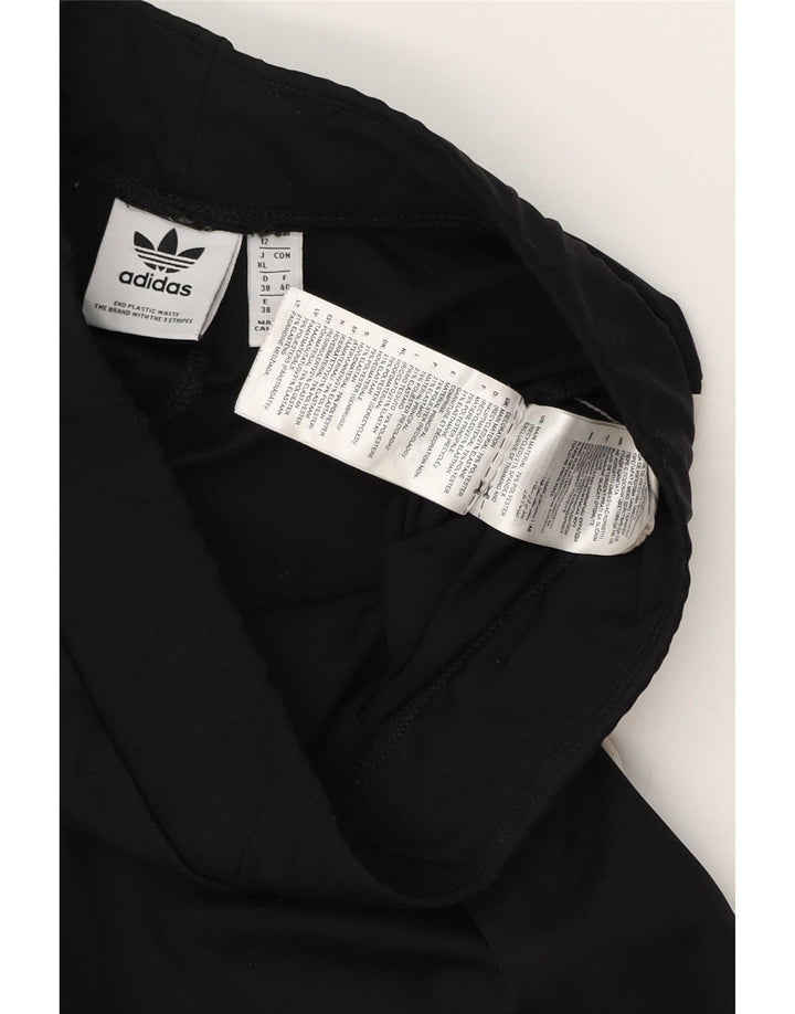 Damskie spodnie dresowe Adidas Flare UK 12, średni czarny poliester