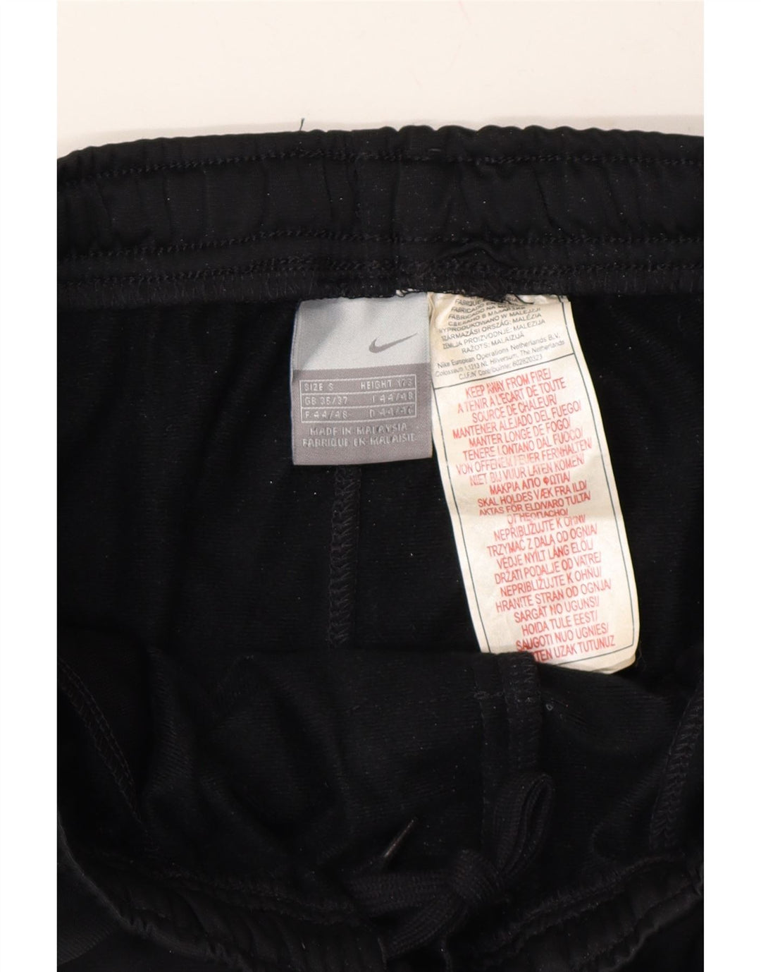 NIKE Mens Tracksuit Trousers UK 35/37 Small  Black Polyester Vintage Nike and Second-Hand Nike from Messina Hembry 