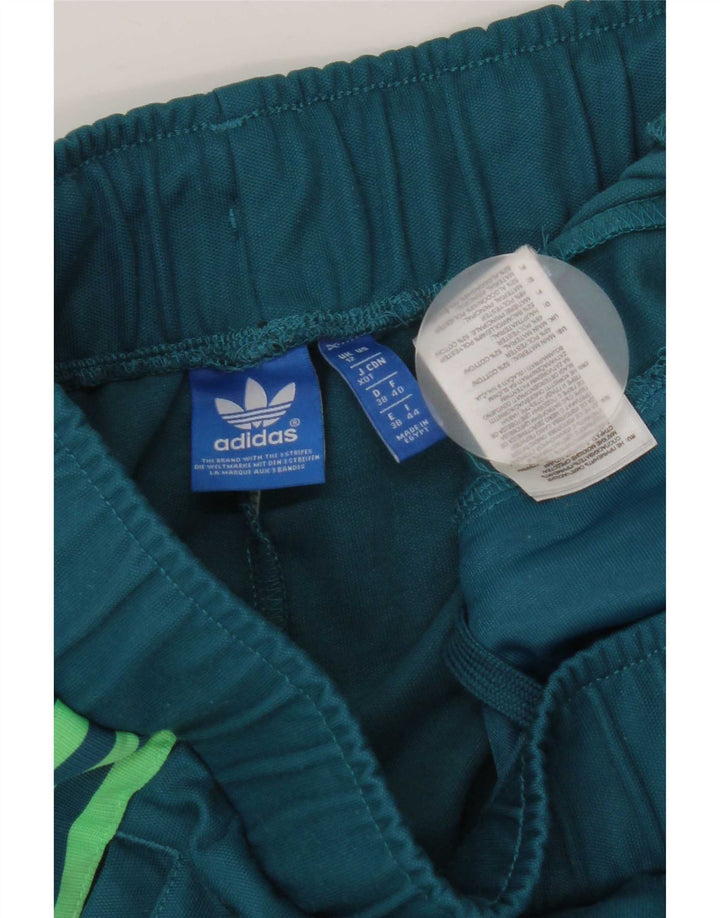 Damskie spodnie dresowe Adidas UK 12 Średni niebieski, bawełniany