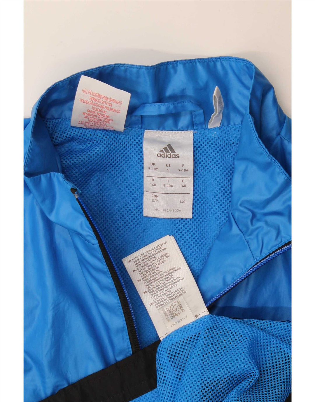 Chłopięca kurtka dresowa Adidas 9-10 lat Niebieski poliester z blokami kolorów
