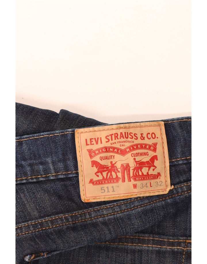 Męskie jeansy Levi's 511 Slim W34 L32 Granatowa bawełna