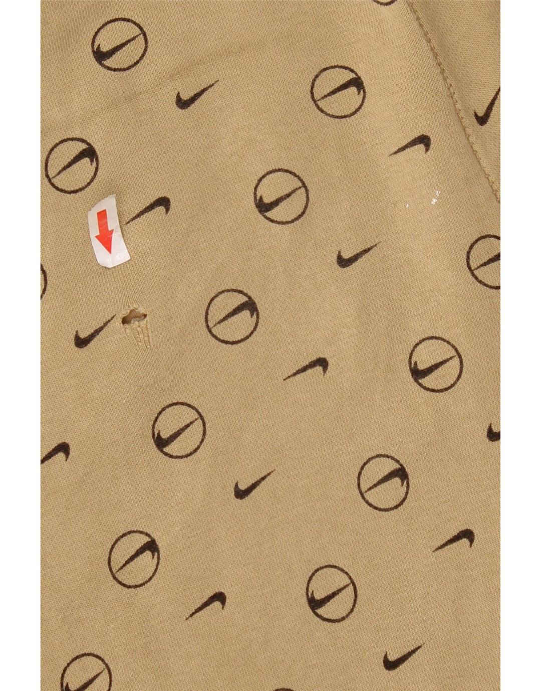 Męskie spodnie dresowe Nike z grafiką, małe, beżowe, geometryczne