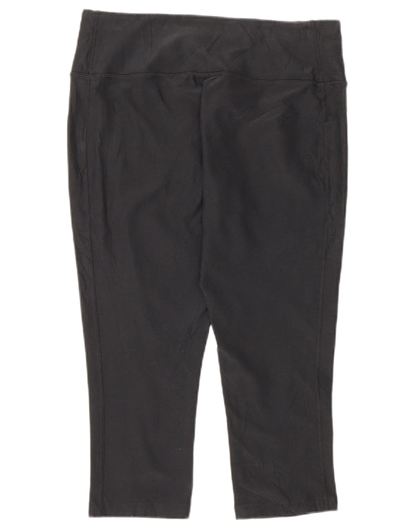 Damskie legginsy Nike Dri Fit Capri UK 12, średni czarny poliester