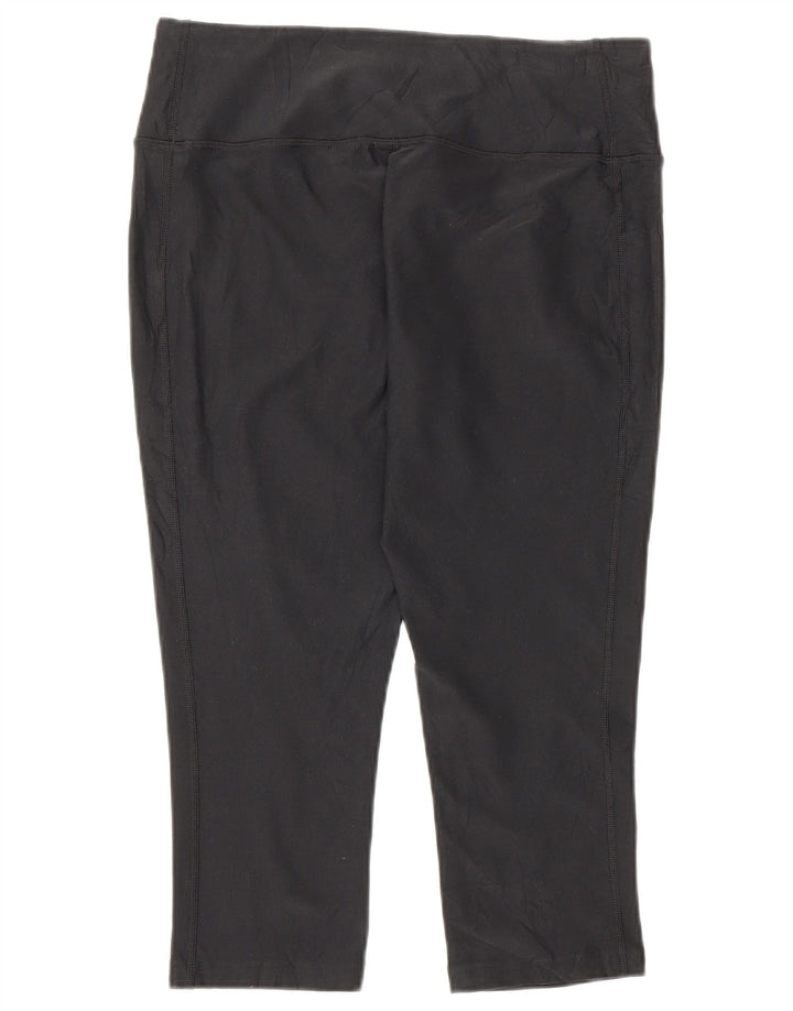 Damskie legginsy Nike Dri Fit Capri UK 12, średni czarny poliester