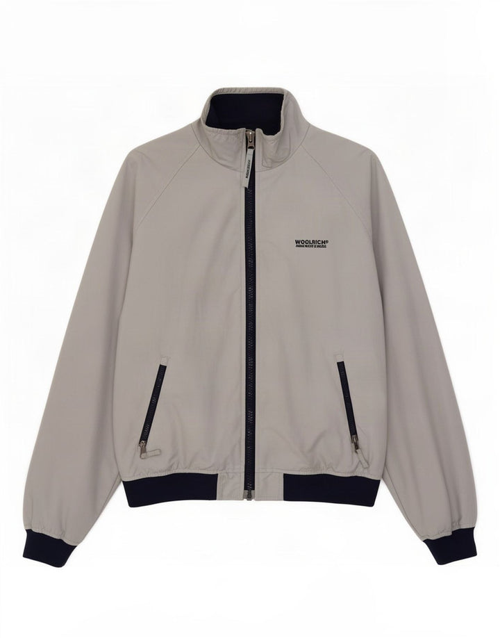 Chłopięca kurtka przeciwdeszczowa Woolrich 13-14 lat, nylon w kolorze niebieskim