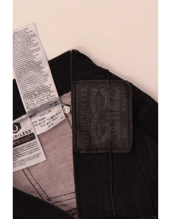 Męskie jeansy Levi's 502 Tapered W33 L34 Czarna bawełna