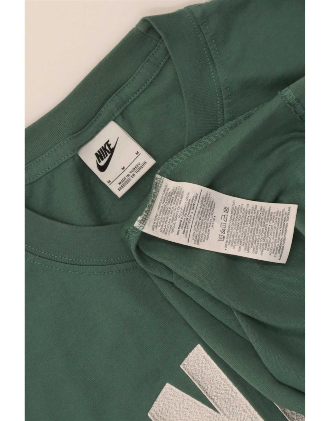 Męski T-shirt Nike z grafiką, bawełniany kolor średniej wielkości w kolorze średniej zieleni