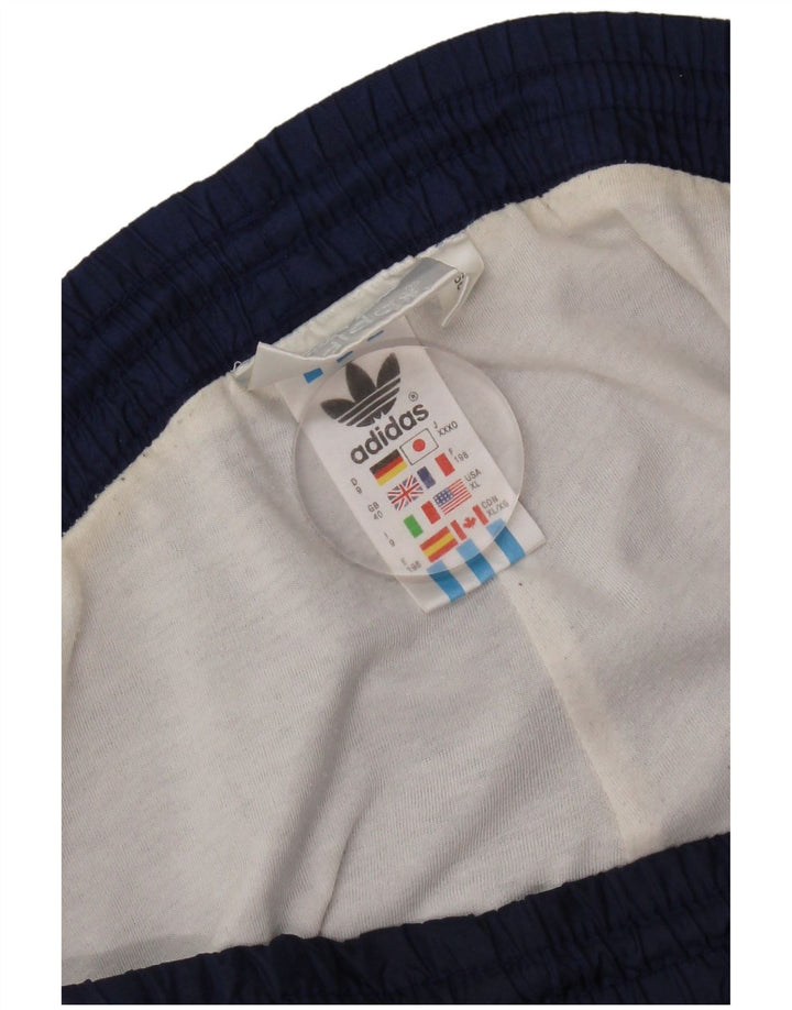 Męskie spodnie dresowe Adidas UK 40 Średni granatowy poliamid