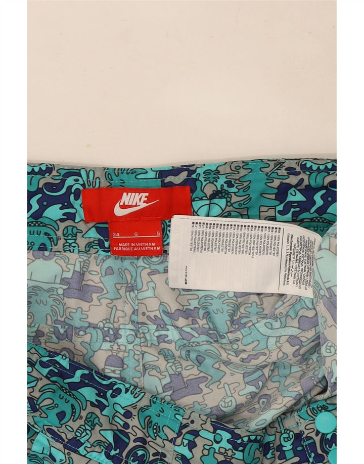 Męskie szorty Nike Graphic Cargo W34, duży, turkusowy poliester z blokami kolorów