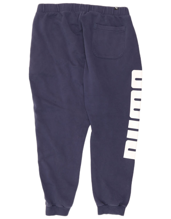 Męskie spodnie dresowe Puma Graphic Joggers XL granatowe