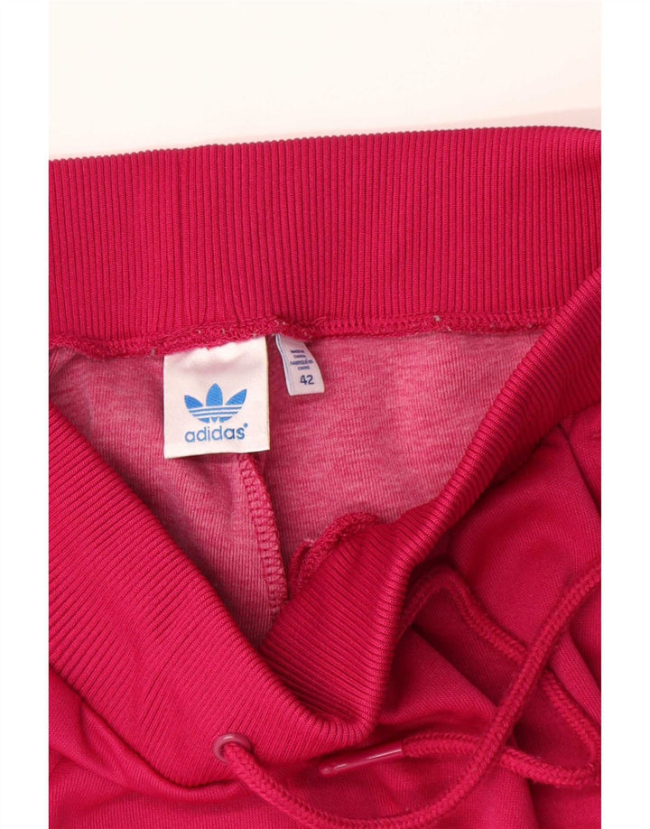 Damskie spodnie dresowe Adidas Joggers IT 42 Small Red Poliester