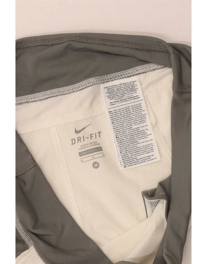 Damskie spodnie dresowe Nike Dri Fit UK 14 w kolorze średniej bieli