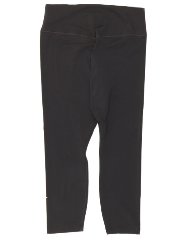 Damskie legginsy Nike Dri Fit Capri UK 12, średni czarny poliester