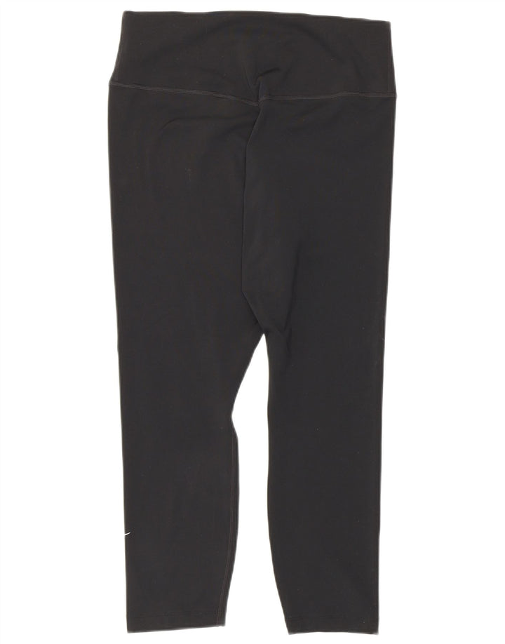 Damskie legginsy Nike Dri Fit Capri UK 12, średni czarny poliester