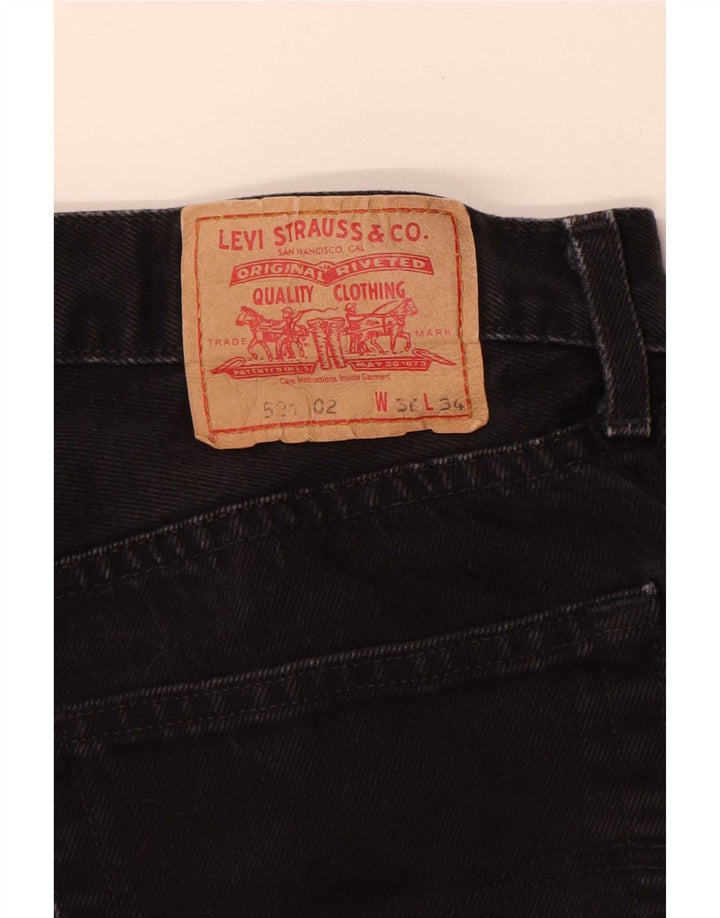 Męskie jeansy Levi's 521 Tapered W36 L32 Czarna bawełna