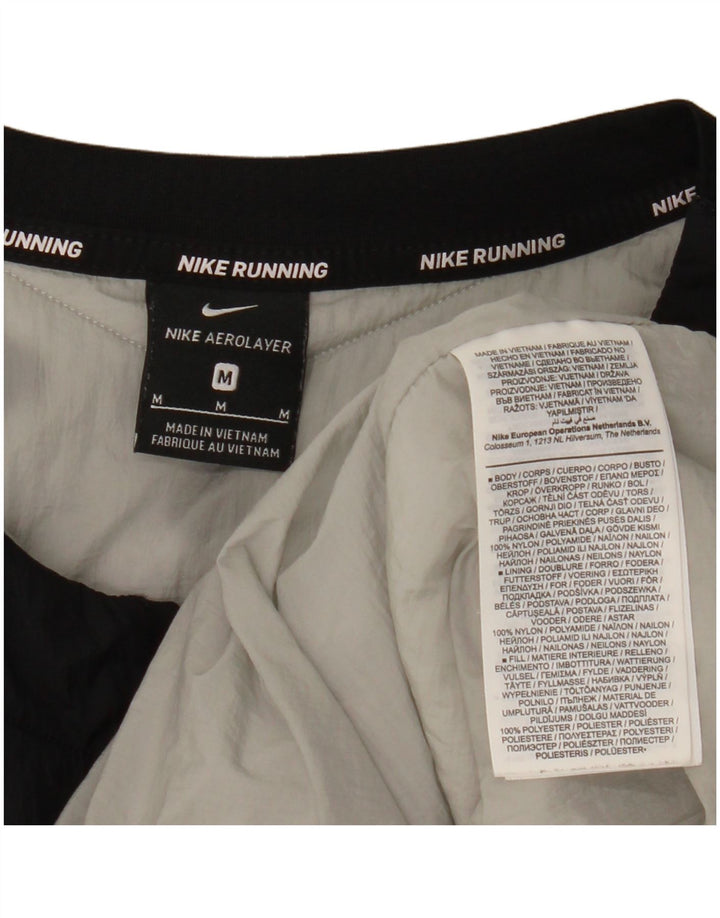 Damska wyściełana kamizelka Nike UK 14, średni czarny nylon