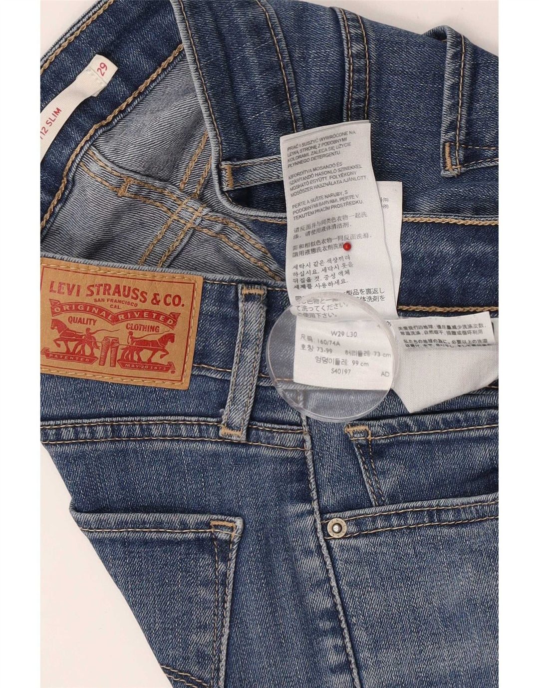 Damskie jeansy Levi's 712 Slim W29 L28 Niebieskie bawełniane
