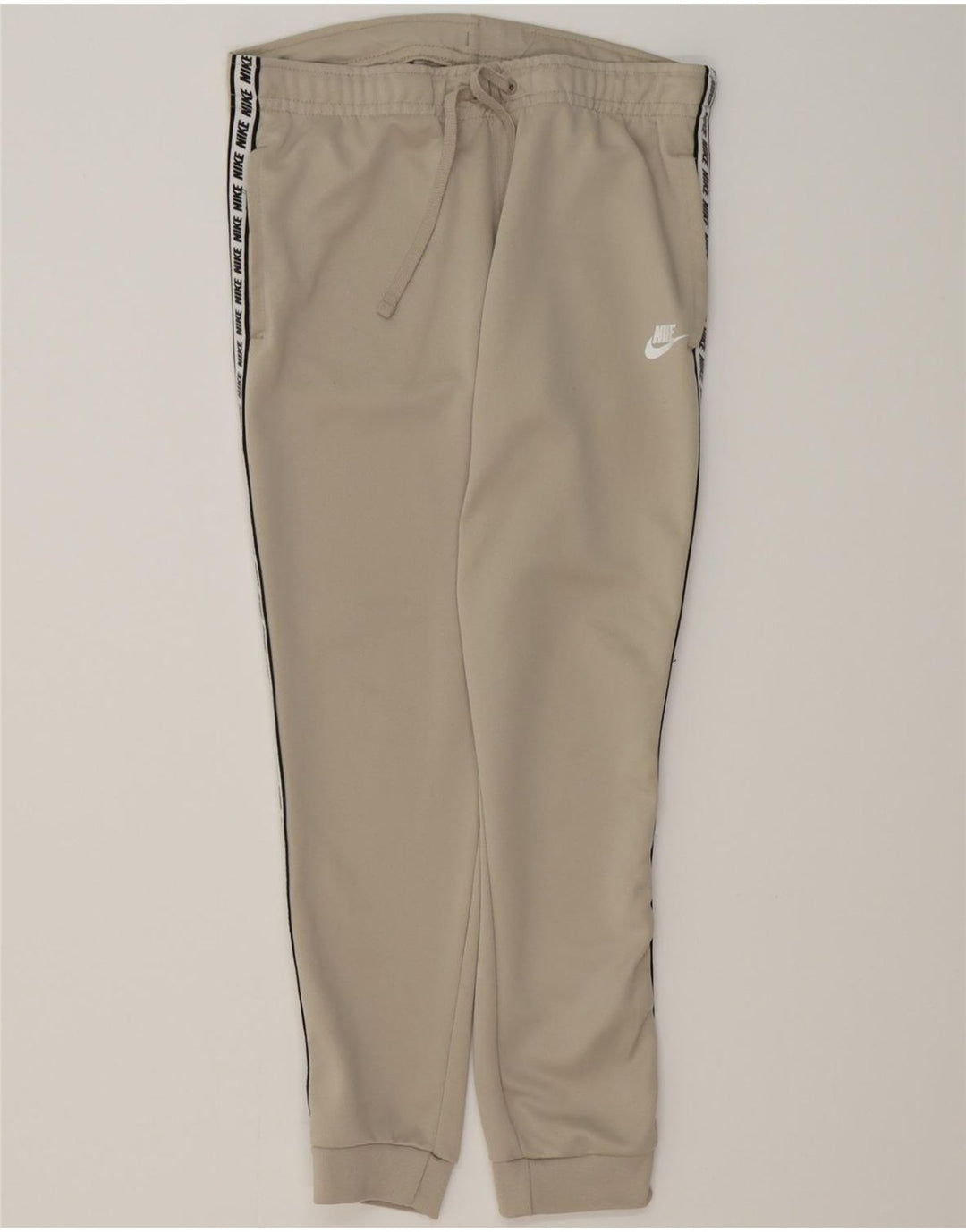 NIKE Mens Graphic Tracksuit Trousers Joggers Small  Beige Polyester Vintage Nike and Second-Hand Nike from Messina Hembry 