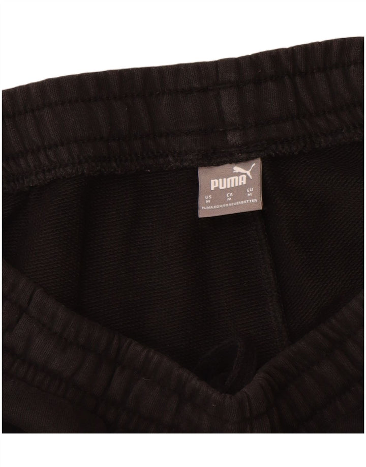 Damskie spodnie dresowe Puma Graphic Joggers UK 12 Medium Black