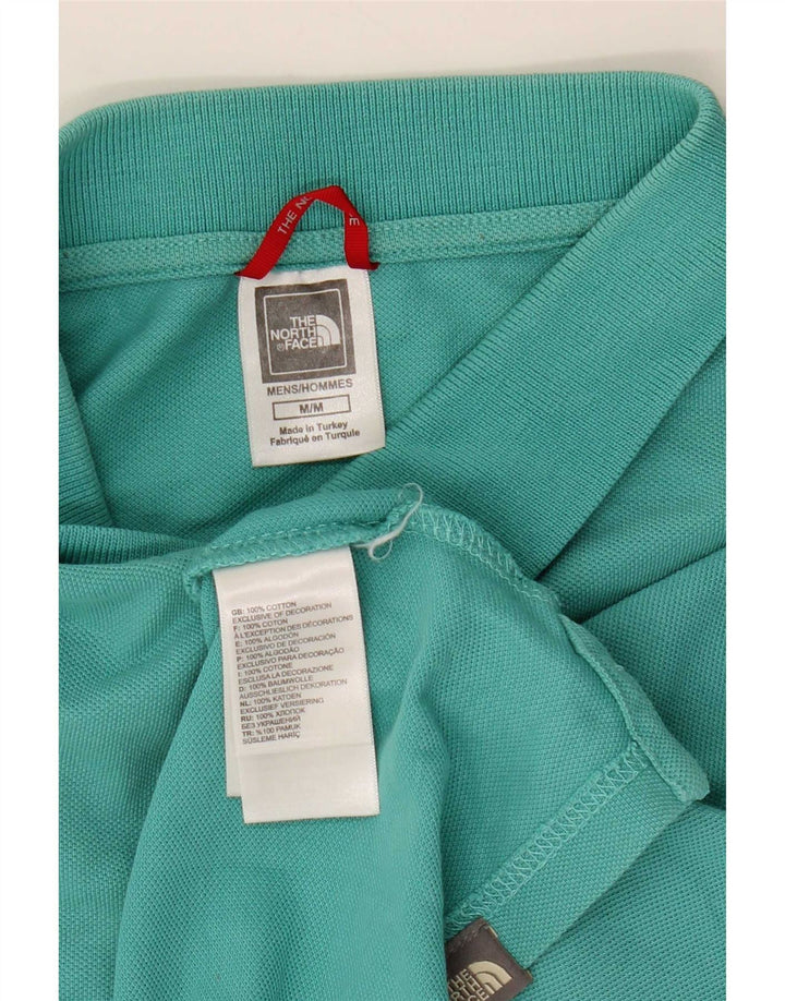 Męska koszulka polo The North Face w kolorze średniego turkusu, bawełniana