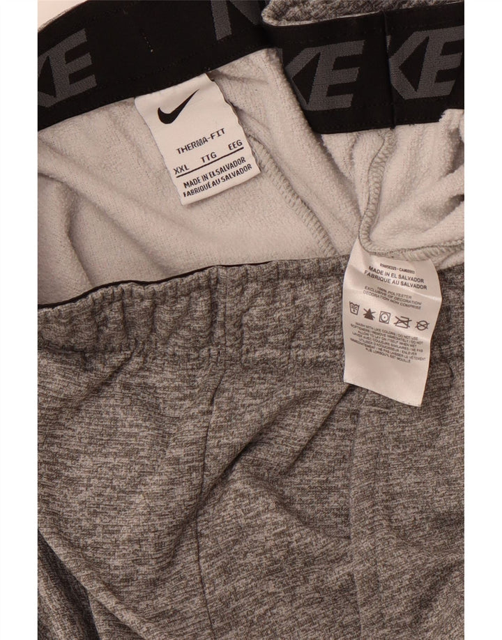 Męskie spodnie dresowe NIKE Therma-Fit Graphic Joggers 2XL Szare nakrapiane