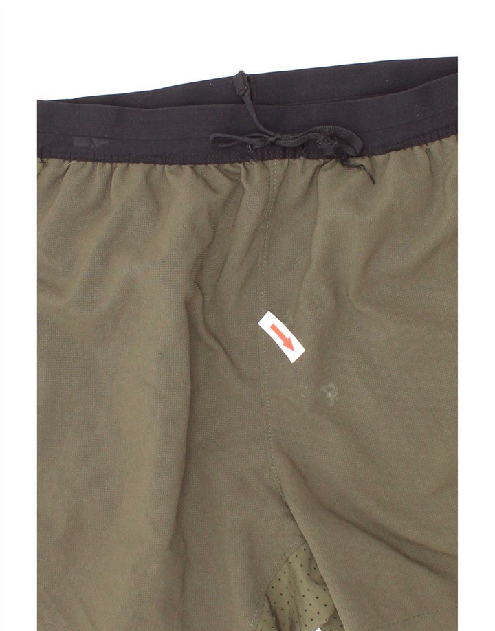 Chłopięce spodenki sportowe Nike Dri Fit 8-9 lat, małe, khaki, poliester z blokami kolorów