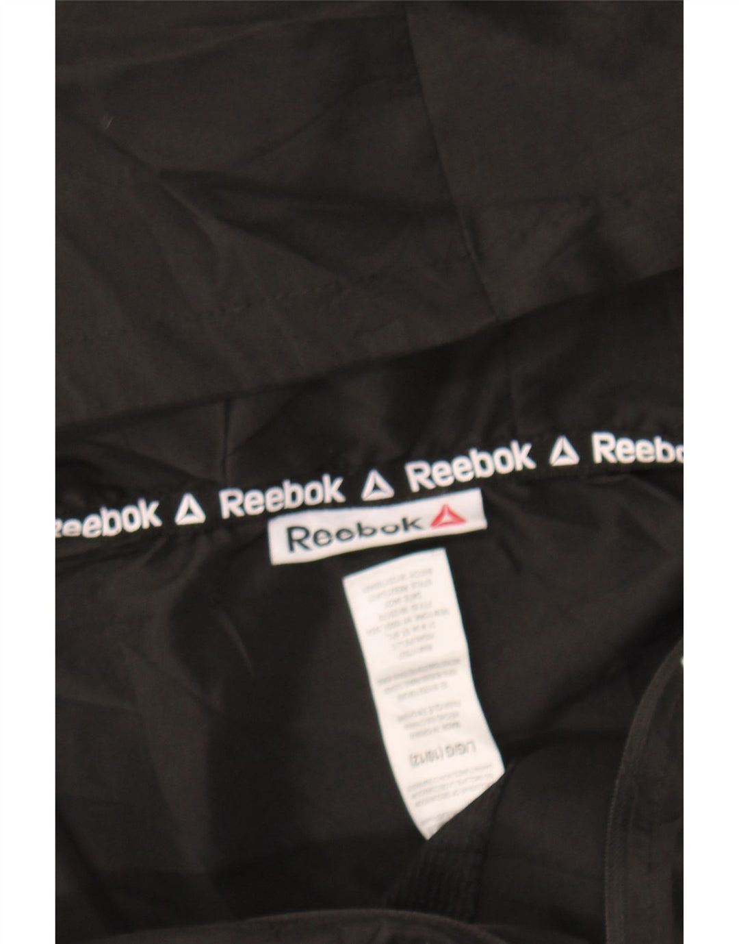REEBOK Boys Graphic Hooded Rain Jacket 10-11 Years Large Black Colourblock Vintage Reebok and Second-Hand Reebok from Messina Hembry 