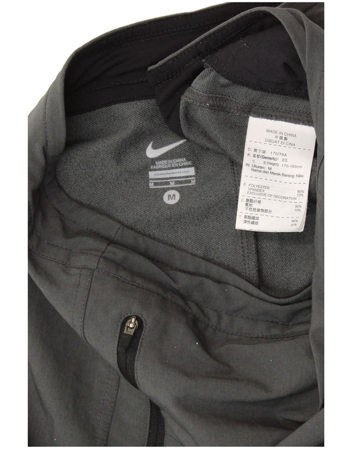 Męskie spodnie dresowe NIKE Średnioszary poliester