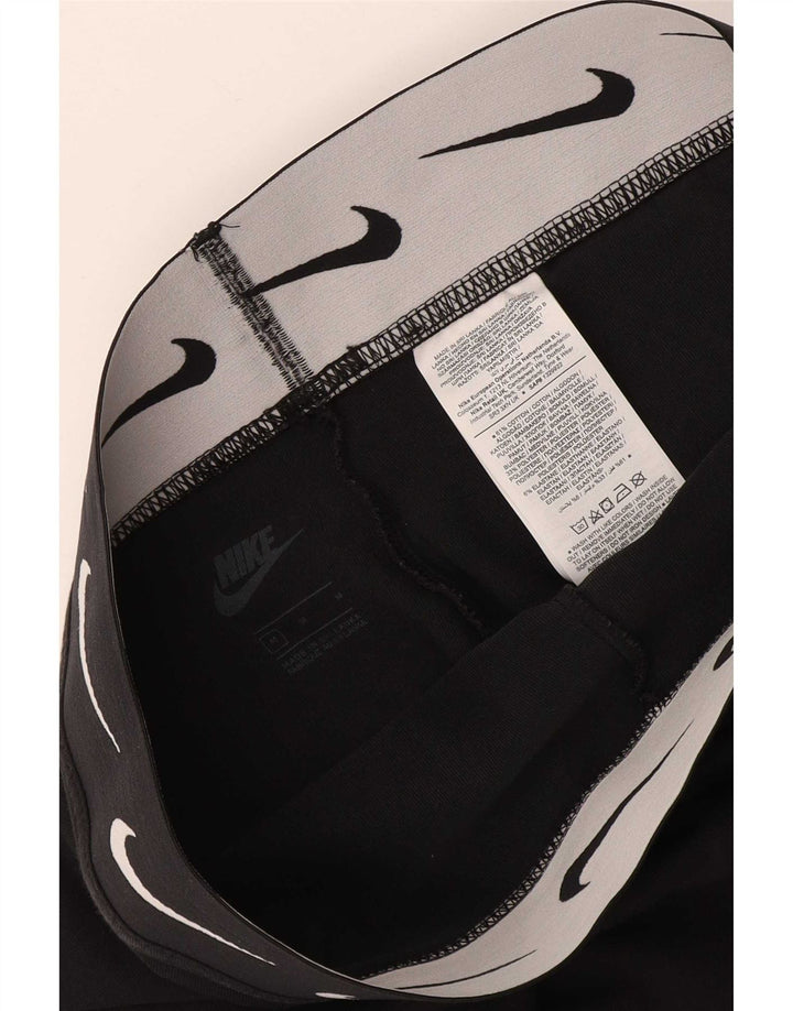 Damskie legginsy Nike Graphic Crop UK 12, średnia czarna bawełna