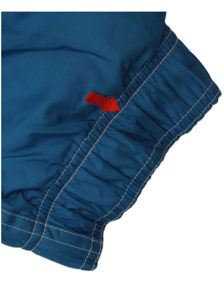 Męski kombinezon narciarski z kapturem Dubin IT 50, poliester w kolorze średnioniebieskim