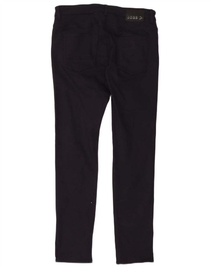 Męskie spodnie typu slim casual Hugo Boss W34 L34 Granatowy poliester
