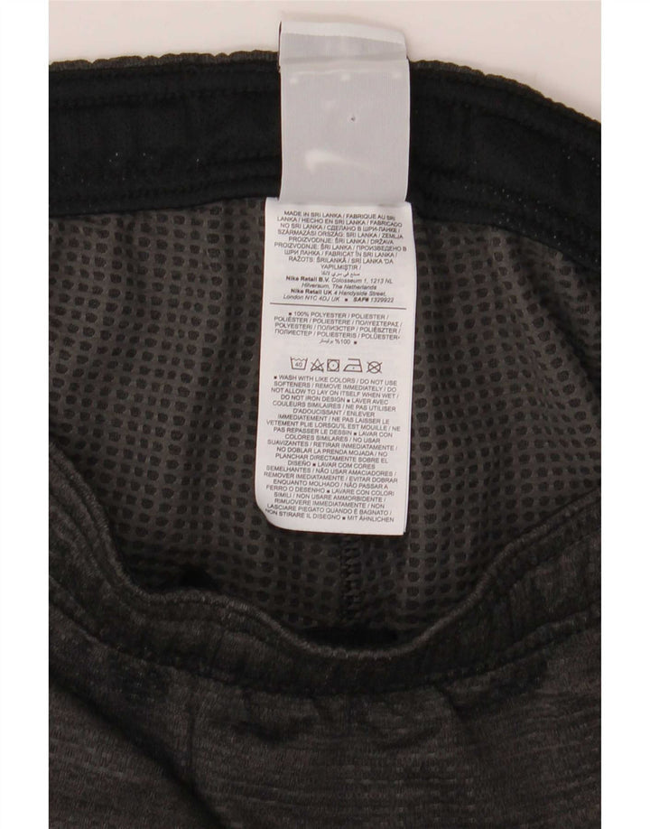 Męskie spodnie dresowe Nike Dri Fit, średnioszare, poliestrowe plamki