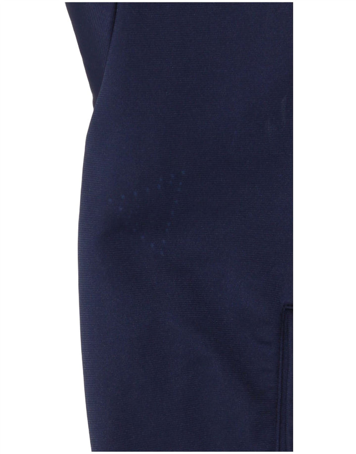 Męska kurtka dresowa ASICS IT 52 z dużym granatowym blokiem kolorów