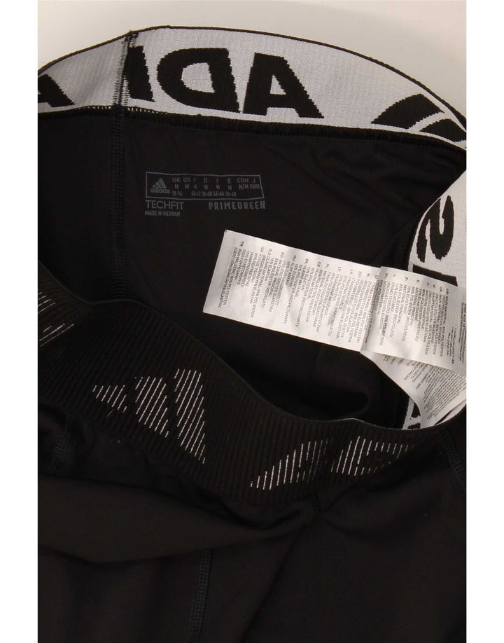 Damskie legginsy Capri Adidas Graphic UK 12/14 Średni czarny poliester