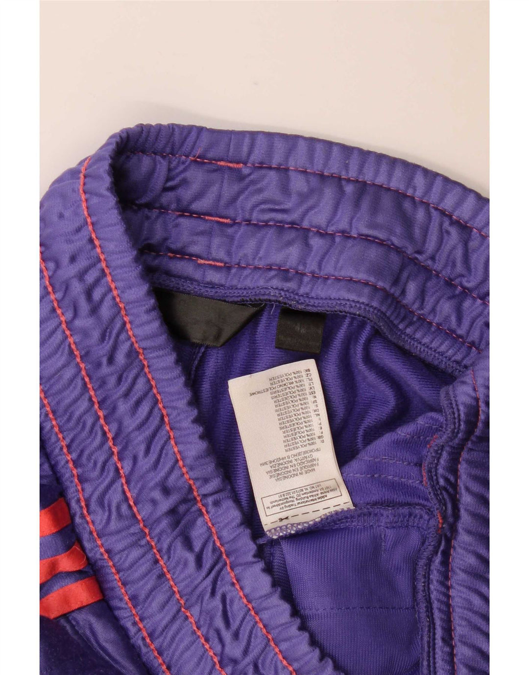Damskie spodnie dresowe Adidas UK 14 Średni fioletowy poliester