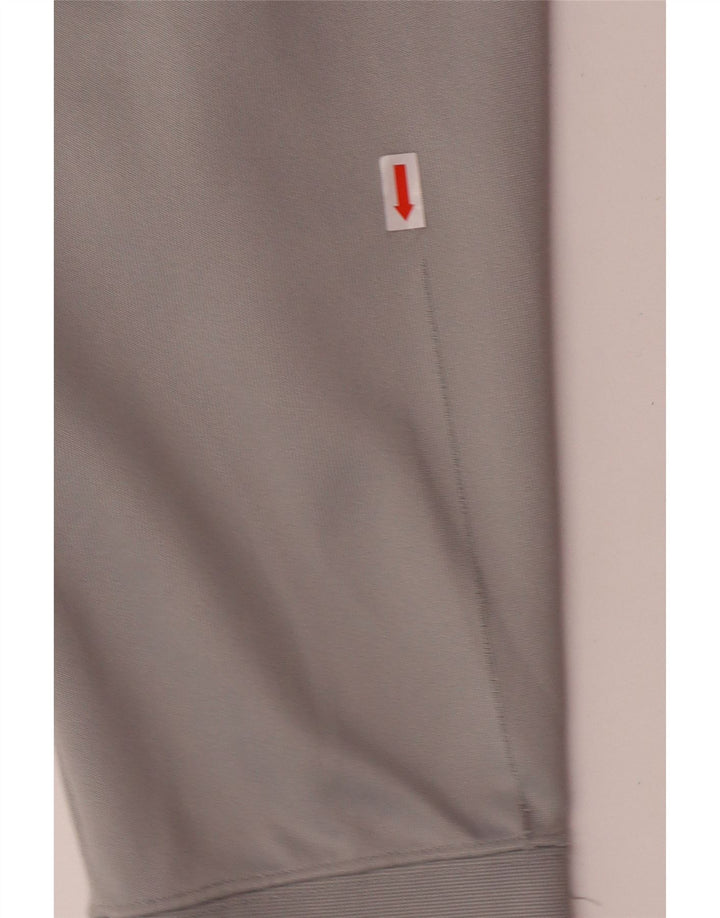 Męskie spodnie dresowe NIKE Joggery w kolorze średnioszarym, z poliestru