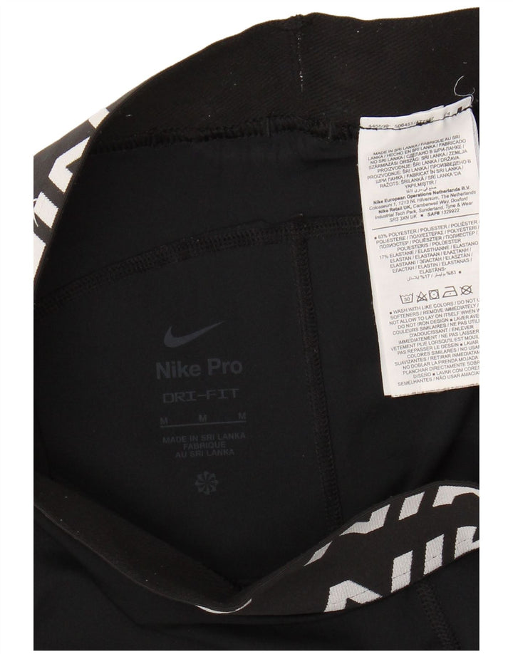 Damskie legginsy NIKE Dri Fit Graphic UK 12, średni czarny poliester