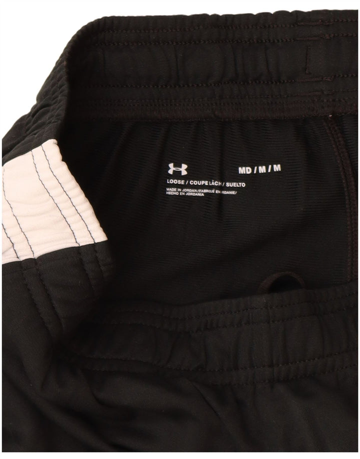 Spodnie dresowe chłopięce Under Armour 9-10 lat, średnio czarne, z blokami kolorów